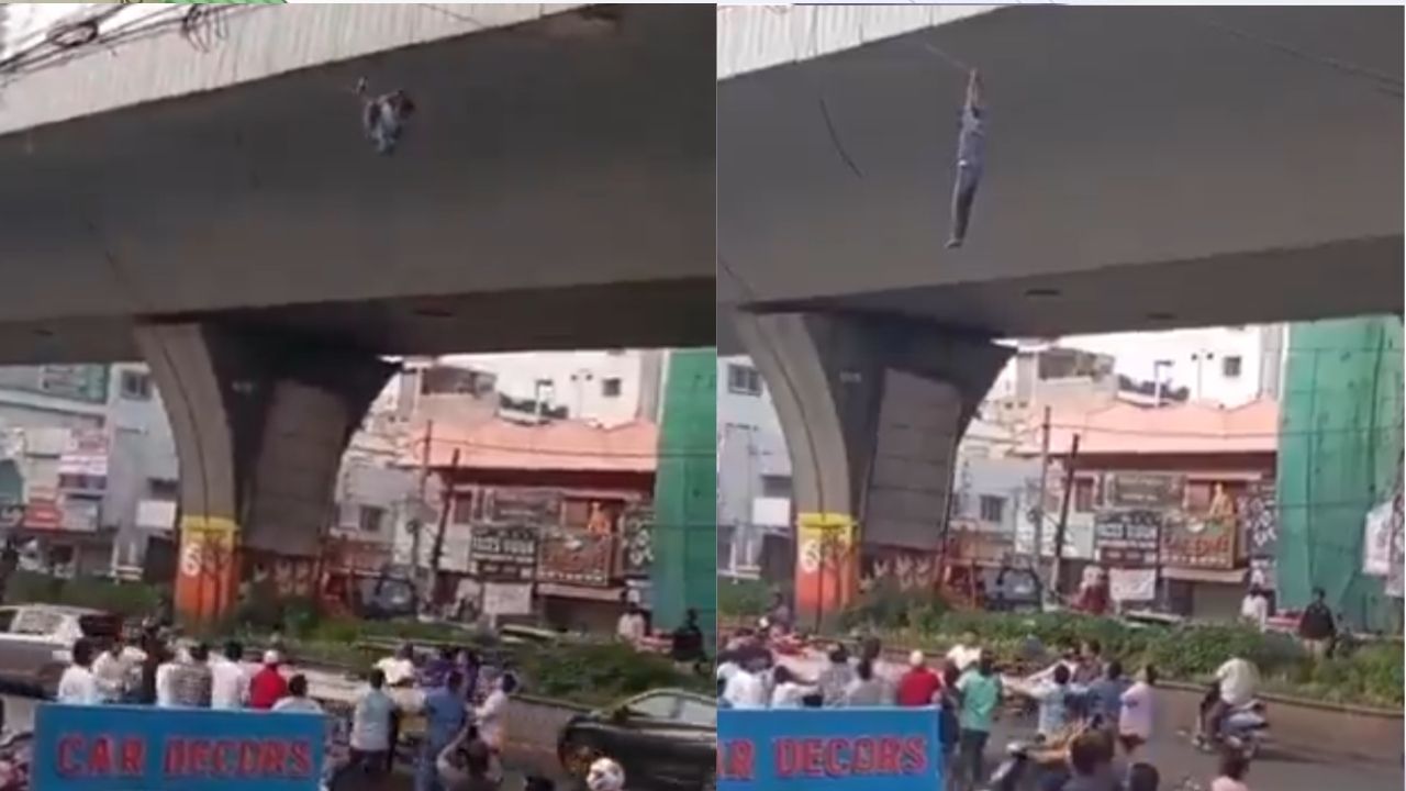 Hyderabad : వైరుకు వేలాడిన తాగుబోతు.. గాల్లో ప్రాణాలు.. పైనుంచి పడేసరికి..