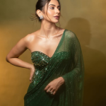 Rakul Preeth Singh : గ్రీన్ శారీలో రకుల్ గ్లామర్ మెరుపులు.. చూపు తిప్పుకోలేరంతే..
